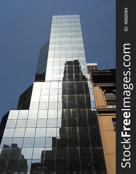 Reflective corporate building on a clear day. Reflective corporate building on a clear day