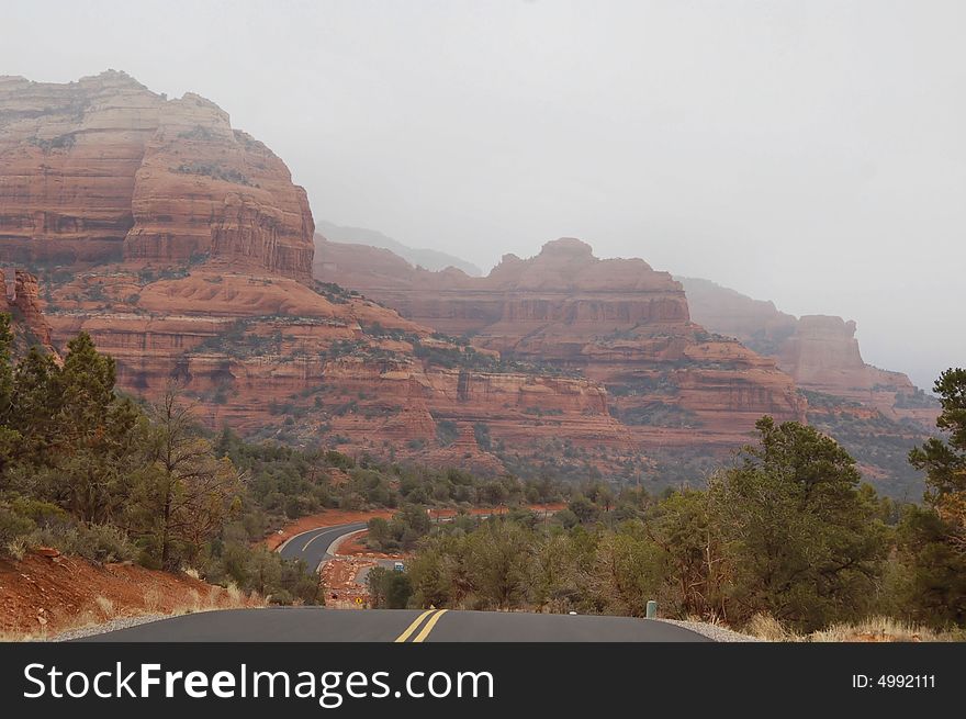 When the clouds lower and the fog rolls, the majesty of these red monoliths work a magic on the senses to rival the greatest imagined fantasy landscapes. When the clouds lower and the fog rolls, the majesty of these red monoliths work a magic on the senses to rival the greatest imagined fantasy landscapes.