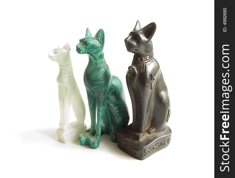 Stone Egyptian cats on a white background