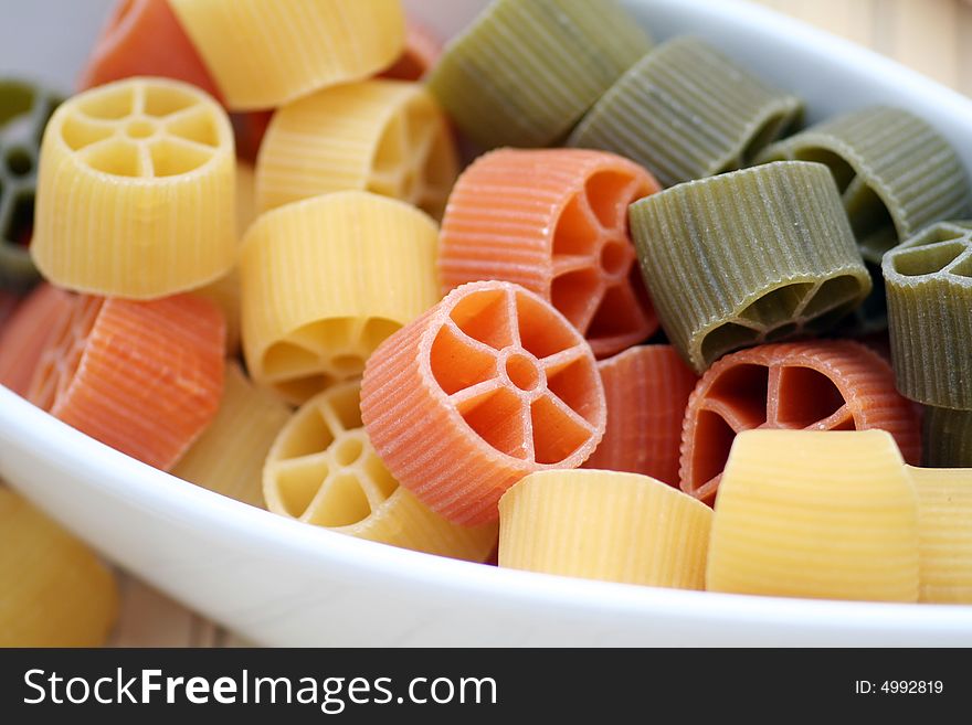 Beautiful table-ware with pasta tricolore