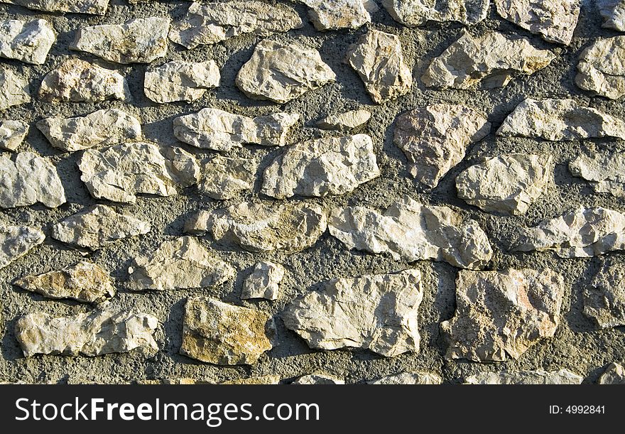 Old lime-stone castle wall. Old lime-stone castle wall