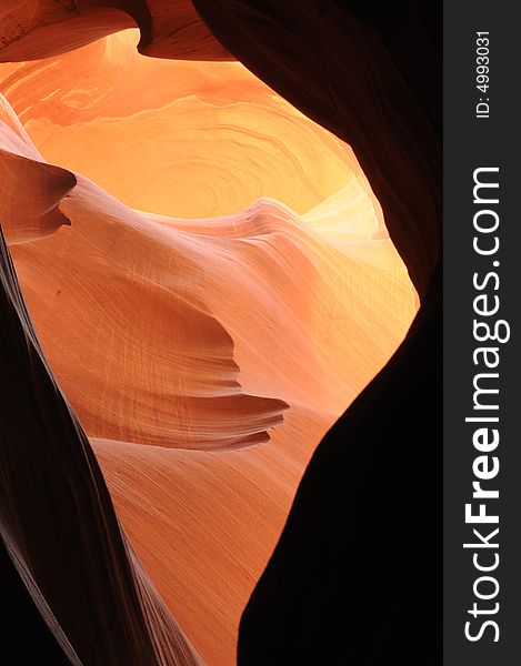 A ray of sunlight cast into Antelope Canyon, Page, Arizona