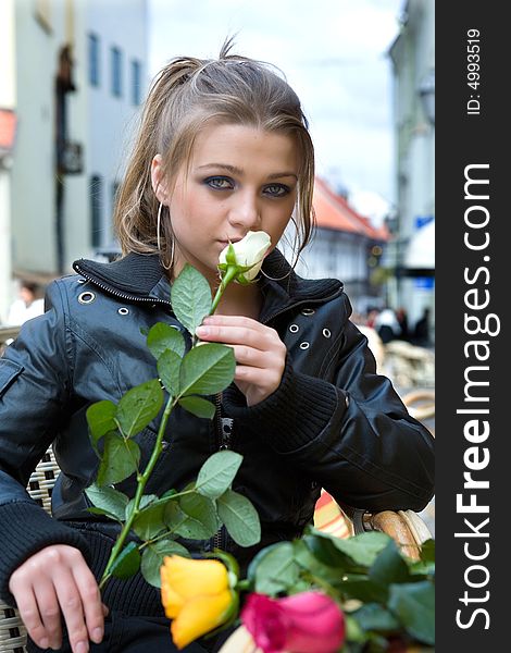 Portrait of the girl with roses