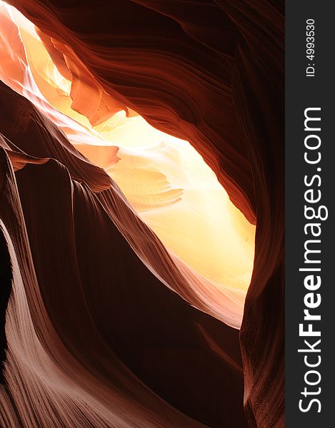 A ray of sunlight cast into Antelope Canyon, Page, Arizona