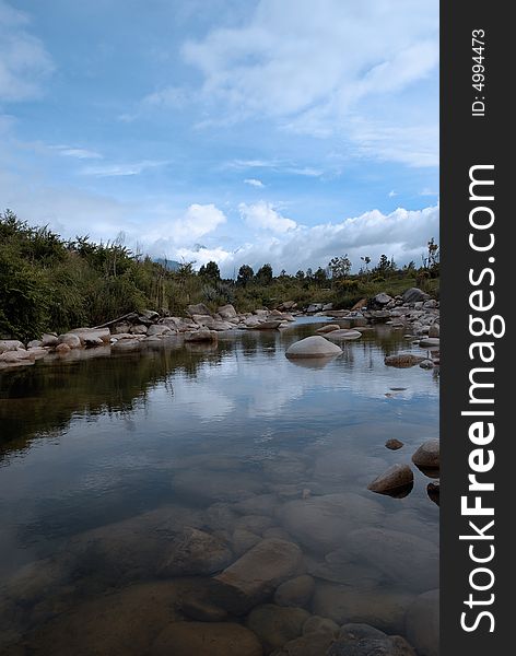 Lake landscape with blue sky and clouds