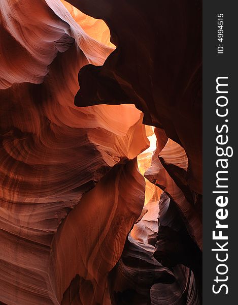 A ray of sunlight cast into Antelope Canyon, Page, Arizona