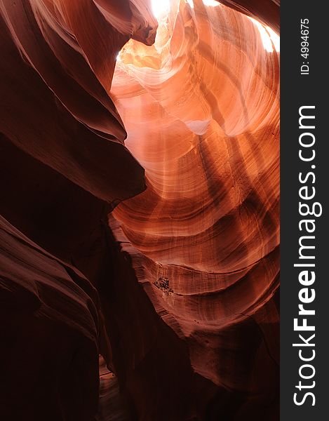 A ray of sunlight cast into Antelope Canyon, Page, Arizona