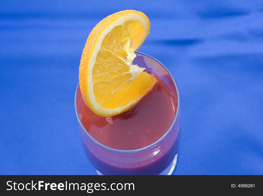 Strawberry smoothie on a blue background