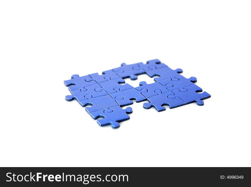 Part of a puzzle isolated on a white. Part of a puzzle isolated on a white