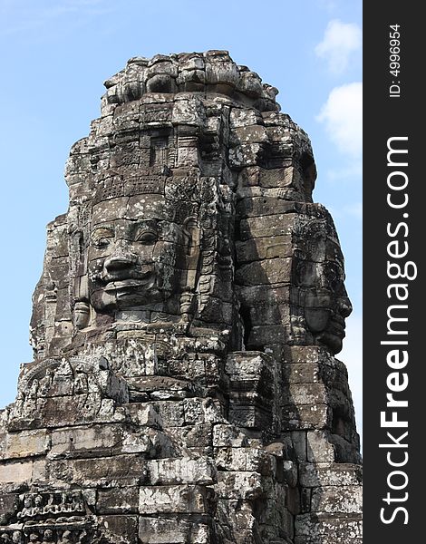UNESCO heritage site Angkoro Temples in Cambodia. Bayon temple. face of idol. UNESCO heritage site Angkoro Temples in Cambodia. Bayon temple. face of idol