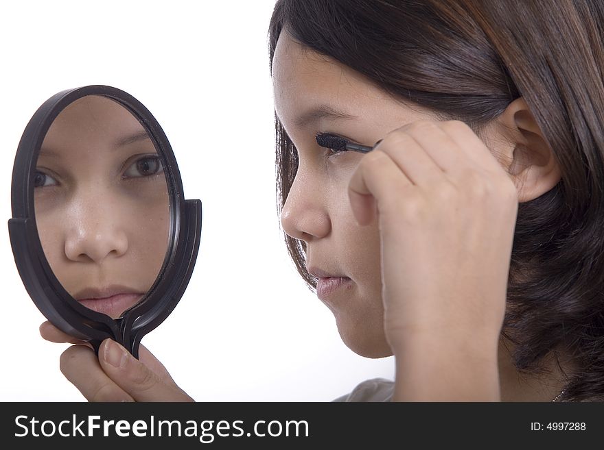 Teenagers applying makeup