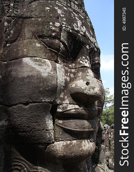 Famous face of bayon from Angkor Temples complex in Cambodia. UNESCO heritage site. Famous face of bayon from Angkor Temples complex in Cambodia. UNESCO heritage site.