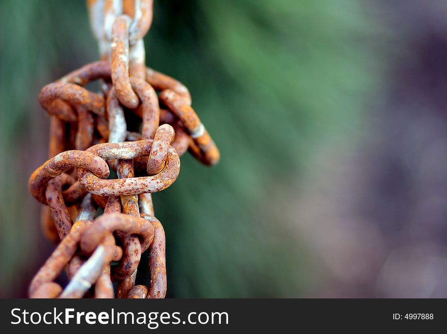 Metal chain weathered by the elements. Metal chain weathered by the elements
