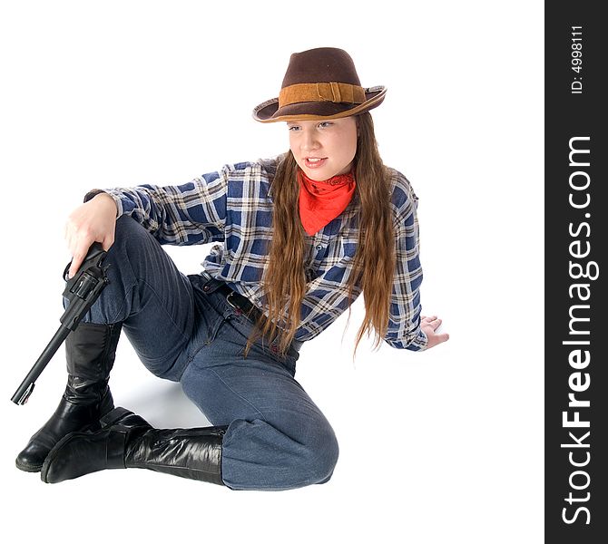 Cowgirl with gun sitting and glares down upon all with the utmost contempt (isolated on white)