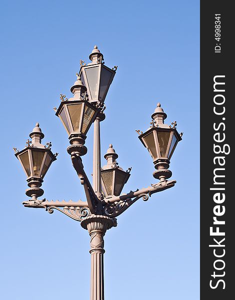 Photo of retro-style forget street lamp. Photo of retro-style forget street lamp