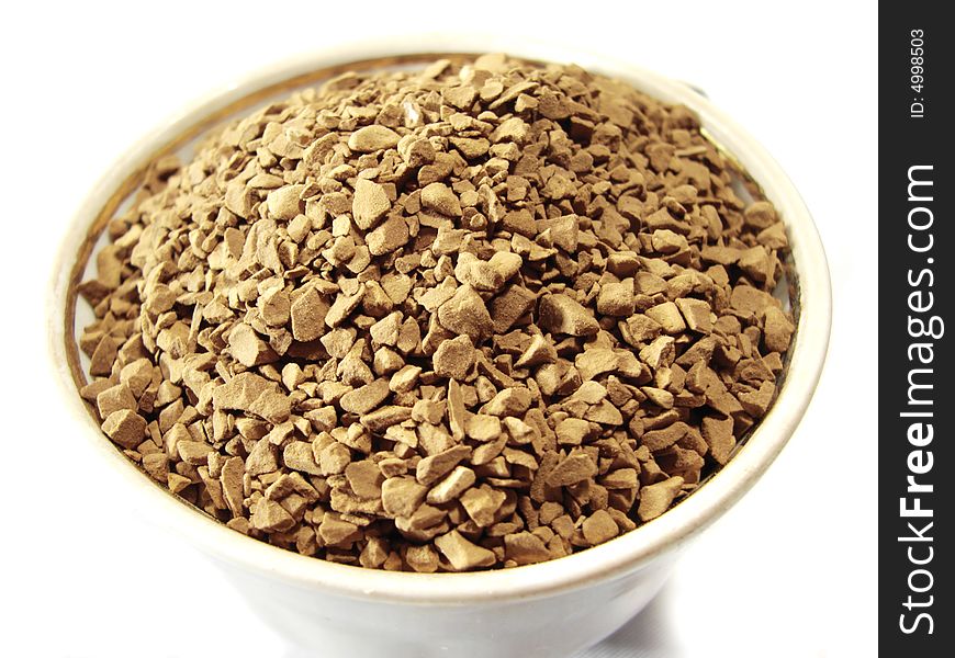 Instant coffee brown granules closeup. Instant coffee brown granules closeup