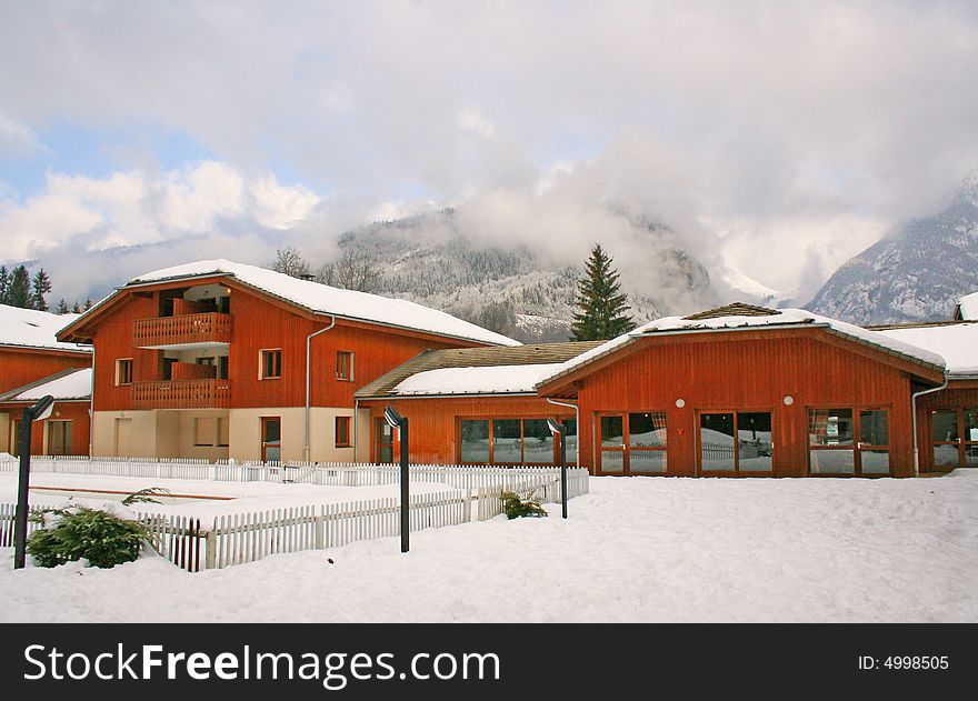 Swiss chalet in snowy Alps. Swiss chalet in snowy Alps