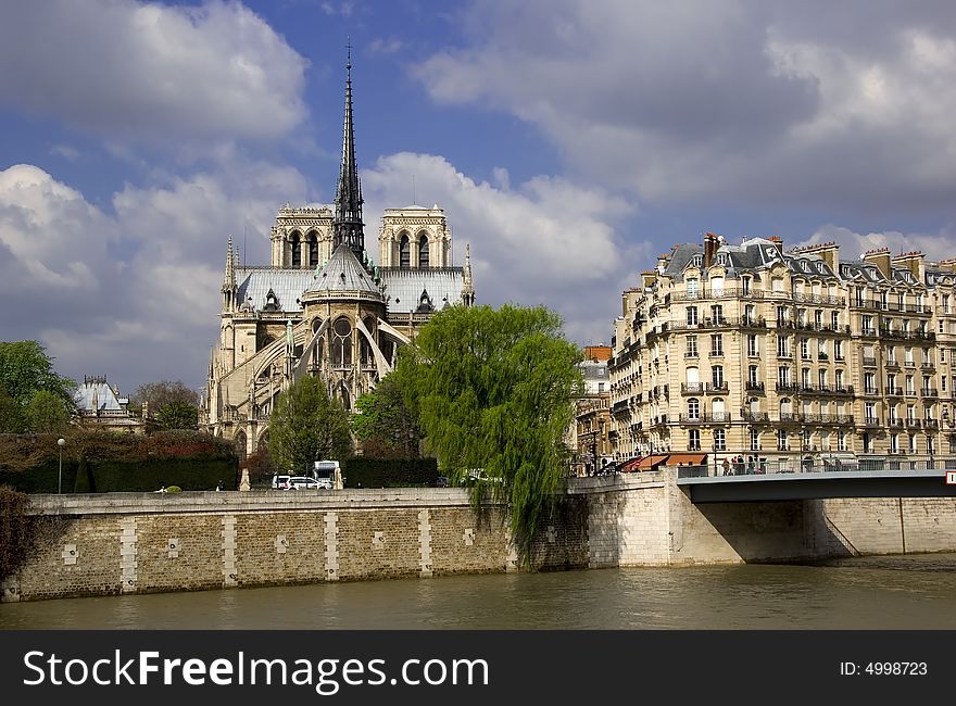 Notre Dame Cathedral on a sunny Spring day with the River Seine in the foreground. Notre Dame Cathedral on a sunny Spring day with the River Seine in the foreground.