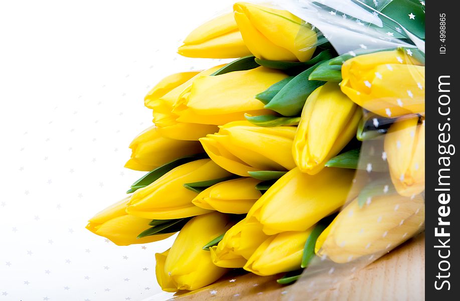 Spring bouquet of yellow tulips