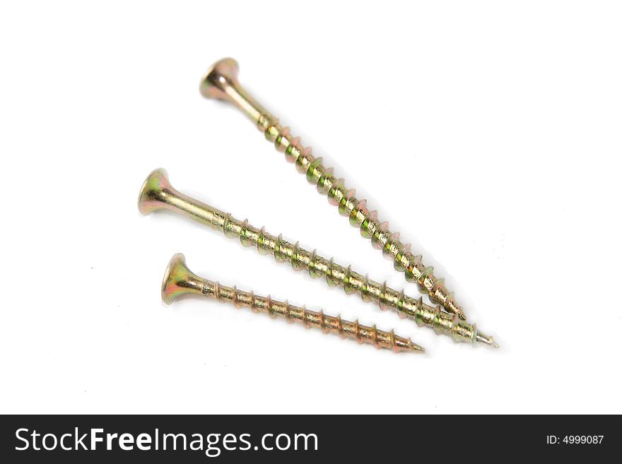 Three Zinc screws isolated on a white background.