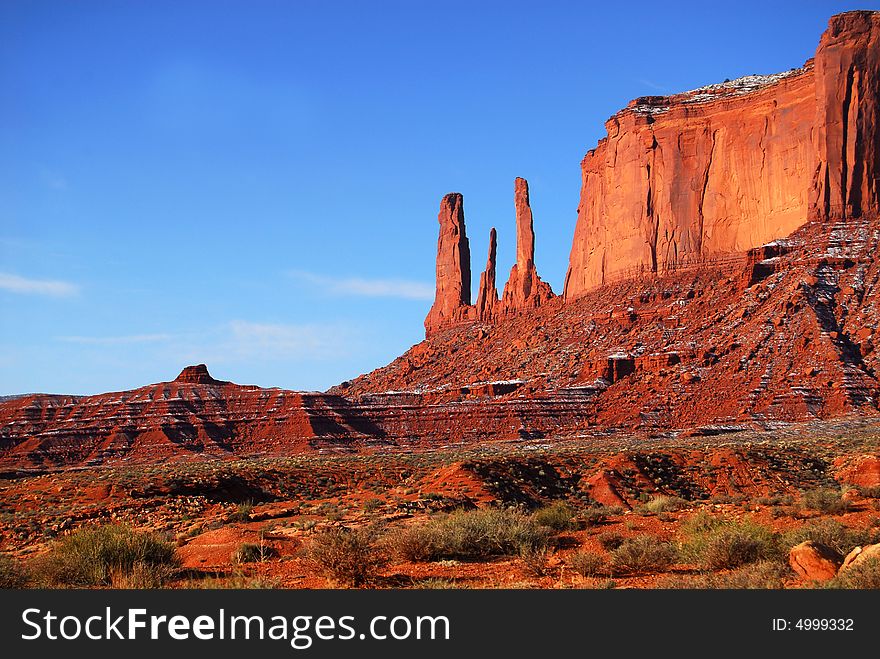 The Three Sisters rock formation found in the Navajo nation land of Monument Valley. The Three Sisters rock formation found in the Navajo nation land of Monument Valley