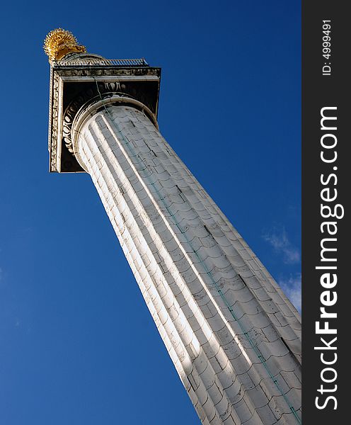 View looking up at the monument to the great fire of London, a famous London landmark. View looking up at the monument to the great fire of London, a famous London landmark.