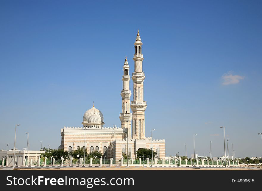 Modern Mosque building against Blue sky