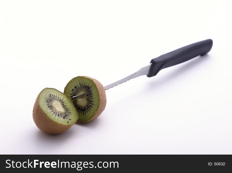 A pair of Sliced kiwi knifed at its core