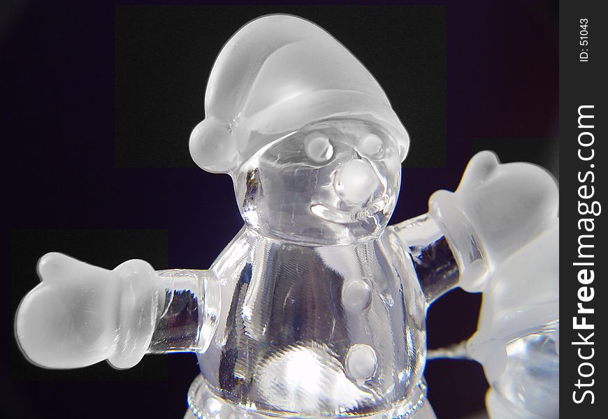 Glass Snowman Isolated on black background