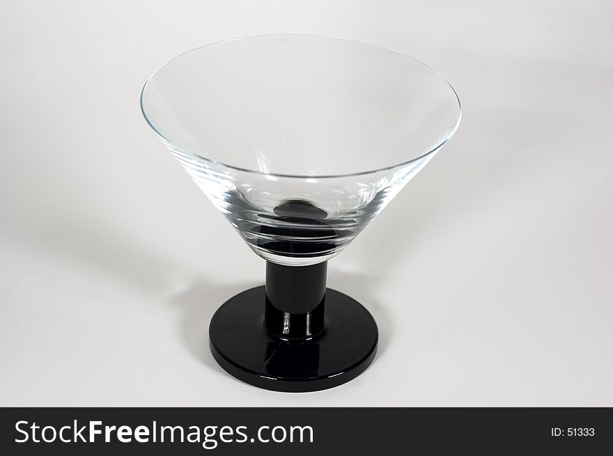 A black-based martini glass. A black-based martini glass