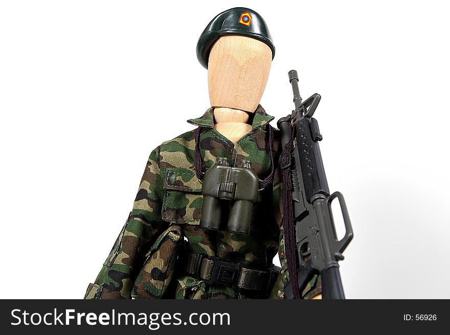 Photo of a Mannequin In Fatigues With Gun on His Shoulder. Photo of a Mannequin In Fatigues With Gun on His Shoulder