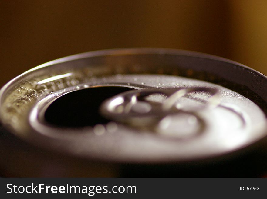 Macro shot of open lid of a beer can. Macro shot of open lid of a beer can.