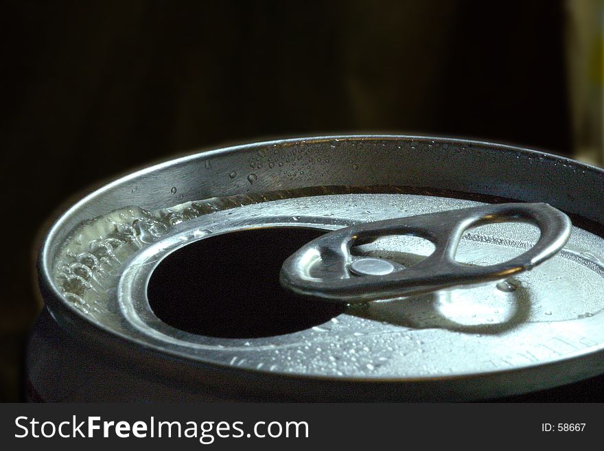 Macro shot of open lid of a beer can.