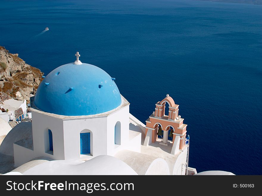 Church in Oia Santorini in front of the Mediterranian sea. Church in Oia Santorini in front of the Mediterranian sea