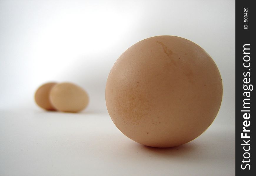 Isolated eggs with focus on the foreground egg.