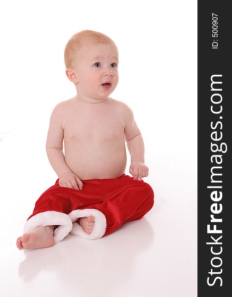 Santa kid sitting on floor. Santa kid sitting on floor