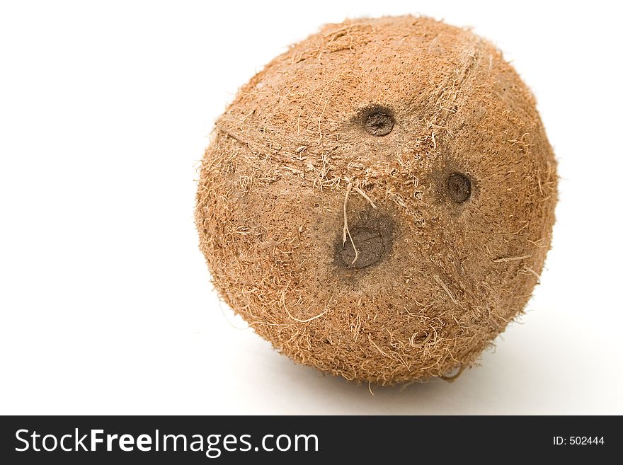 Bowling - A coconut isolated on white background - could be used as bowling ball. Bowling - A coconut isolated on white background - could be used as bowling ball.