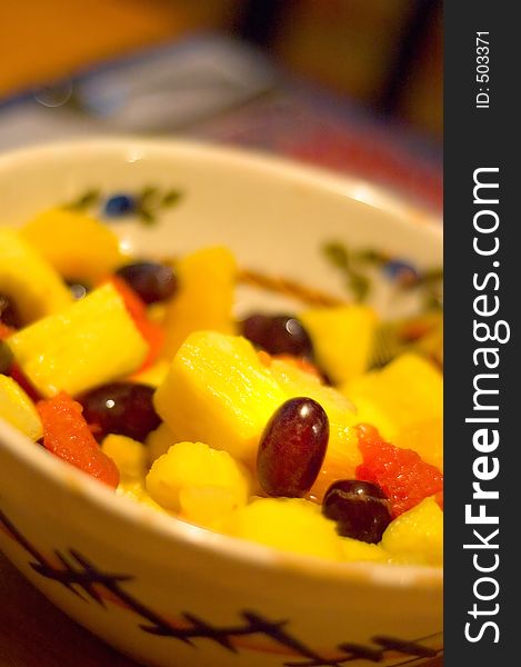 Close-up of fruit salad in handcrafted bowl