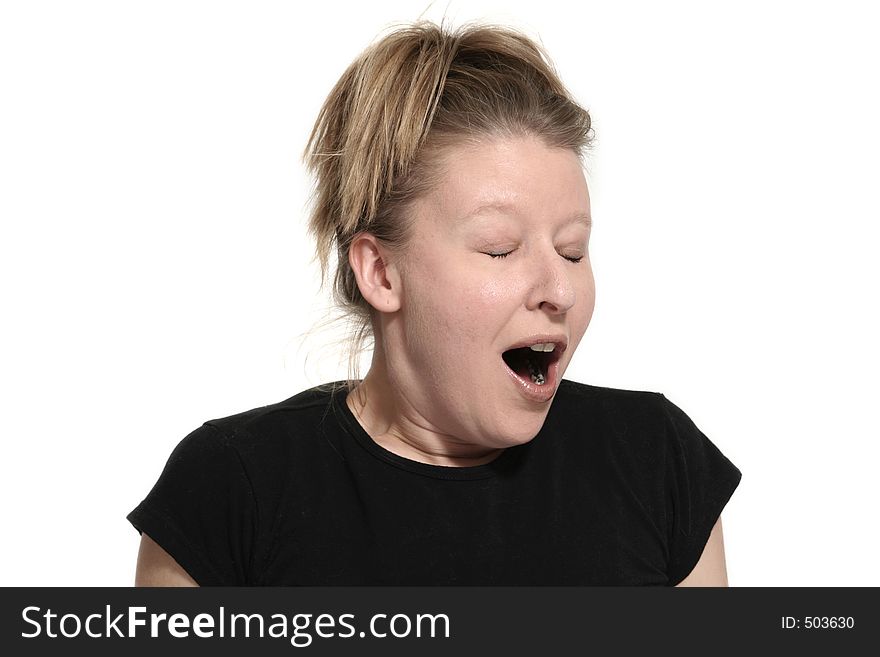 Woman yawning over white