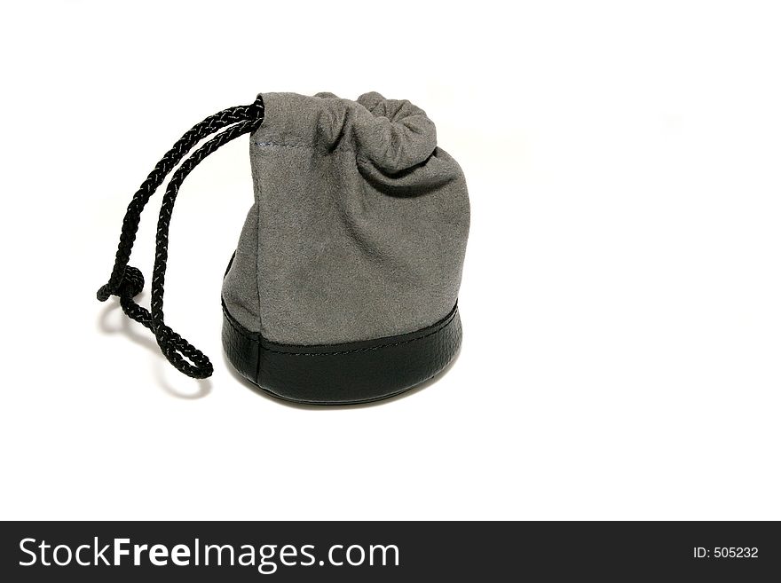 Grey and black camera lens pouch against a white background. Grey and black camera lens pouch against a white background.