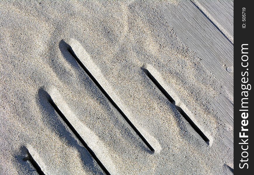 Sand On A Boardwalk