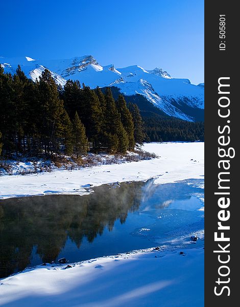 Open water on the Maligne River in Jasper National Park during mid winter. Open water on the Maligne River in Jasper National Park during mid winter.