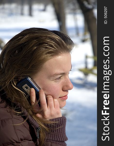 Young girl talking on the cell phone