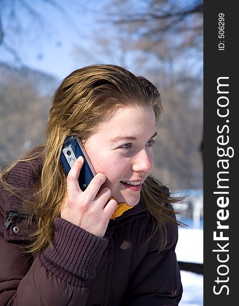 Young girl talking on the phone