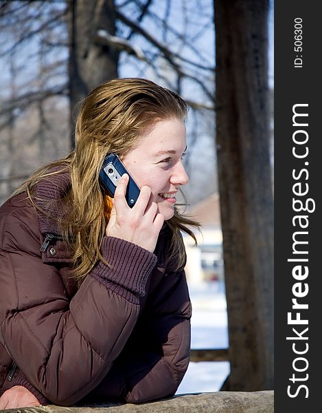 Young girl talking on the cell phone