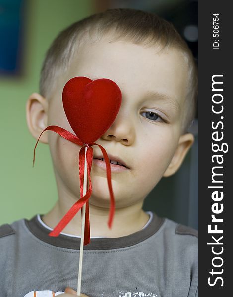 Young boy with Valentine heart