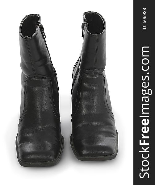 Pair of woman's boots with clipping path over white. Pair of woman's boots with clipping path over white.