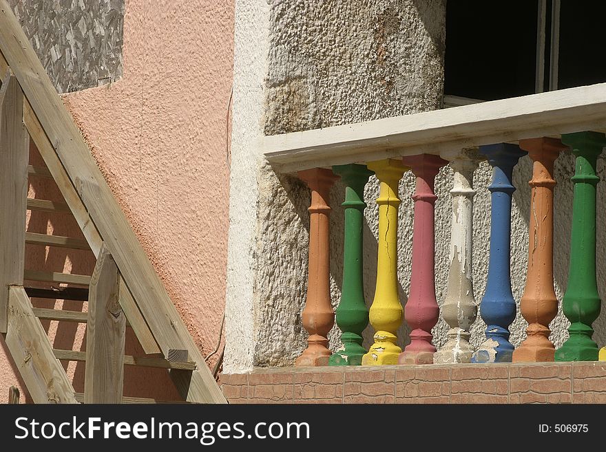 Section of a house featuring Colorful Porch Posts