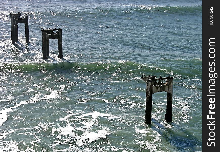 A derelict pier, in the pacific, near Davenport, California.