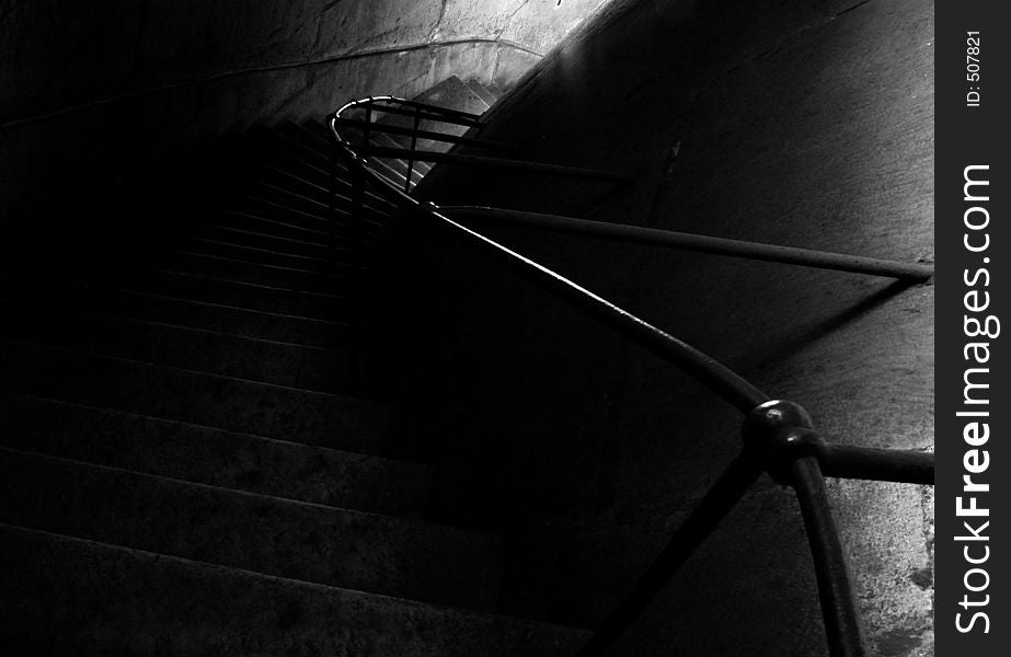 Black and white stone stairs between light and shadows. Black and white stone stairs between light and shadows